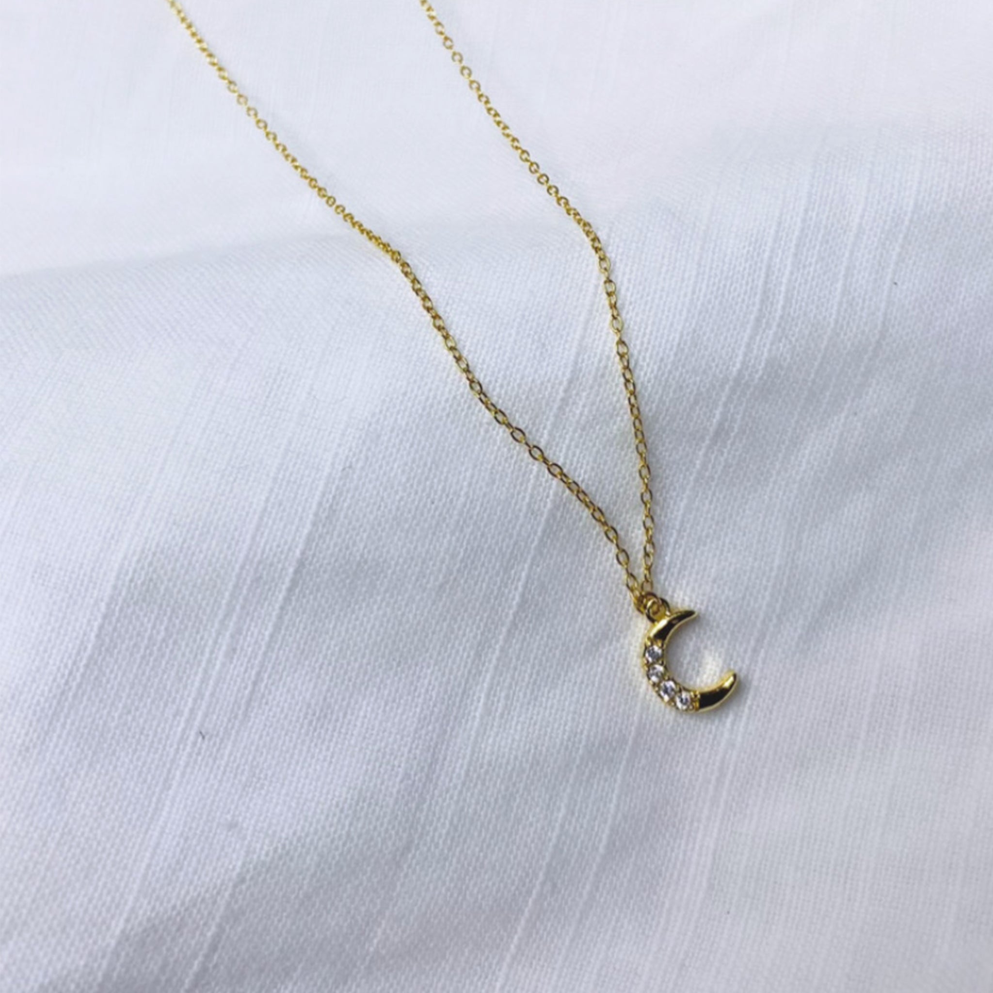 Mini moon pendant necklace