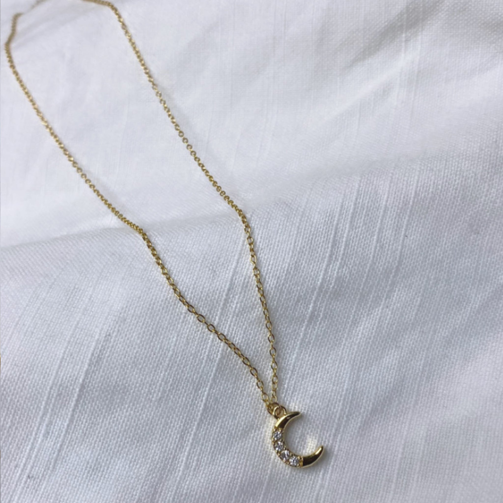 Mini moon pendant necklace