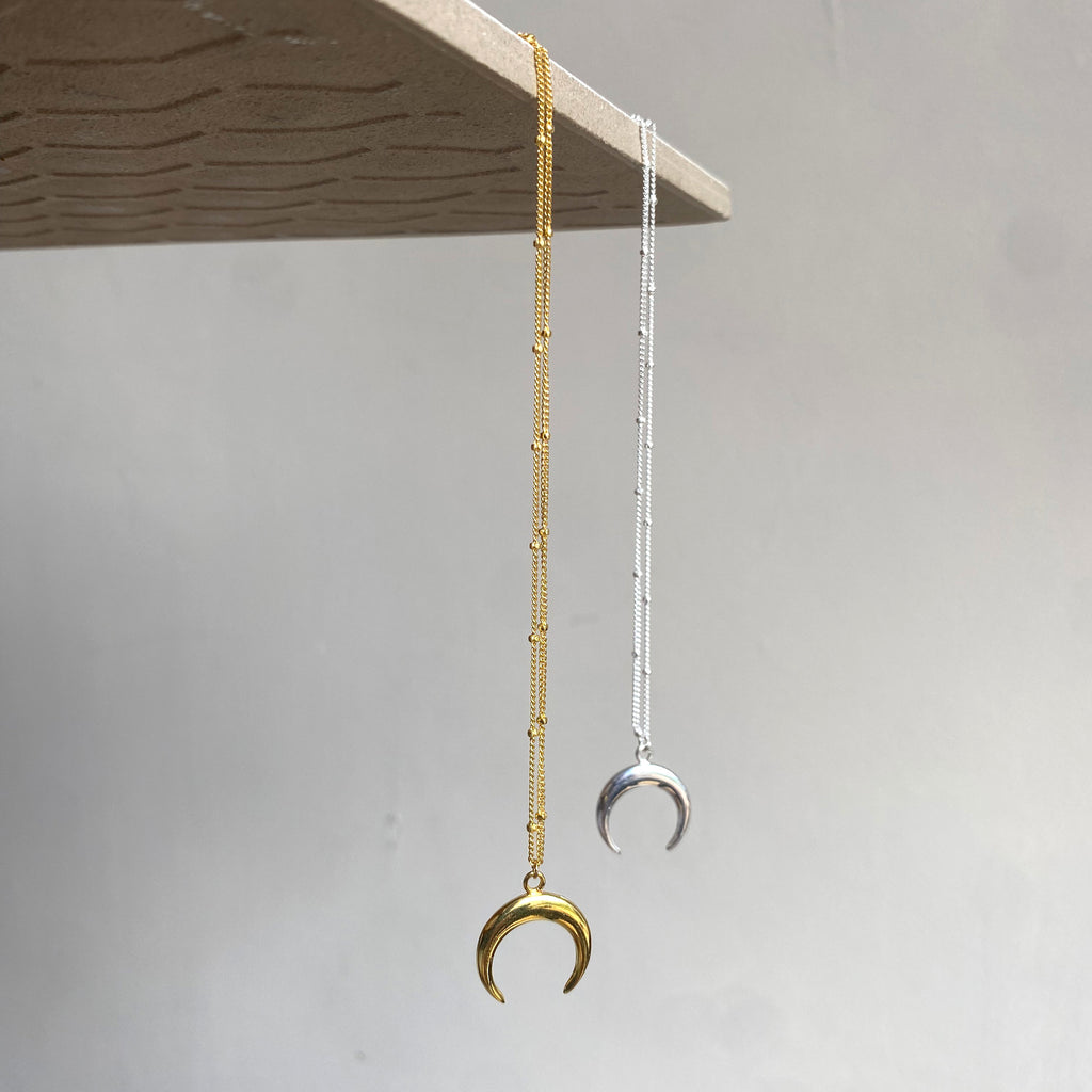 Crescent pendant necklace